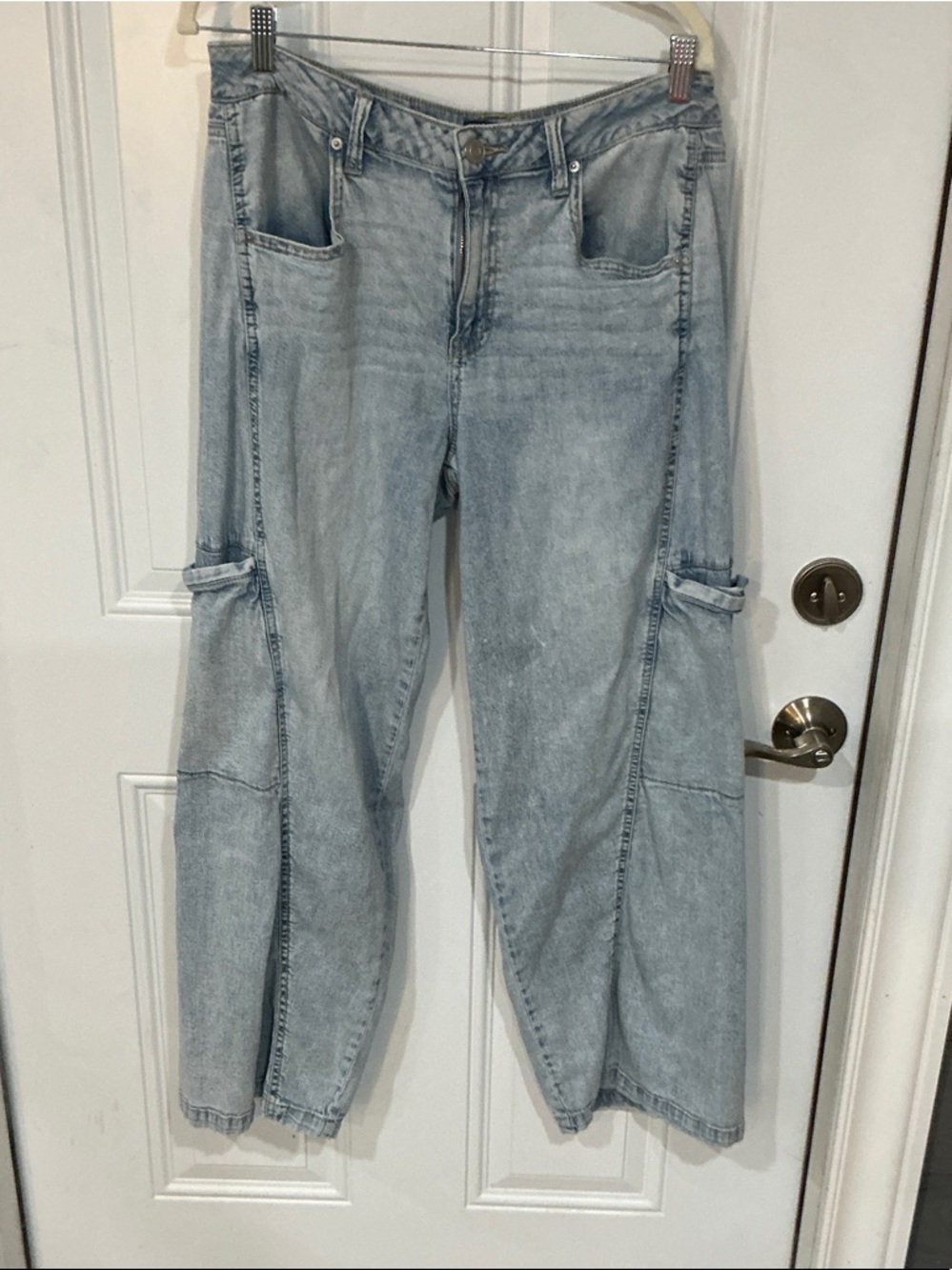 Light Wash Women's Cargo Jeans - Casual Wide-Leg Denim. Brand is Project Indigo